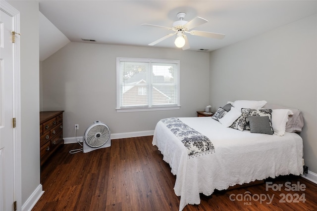 bedroom with lofted ceiling, ceiling fan, and dark hardwood / wood-style floors