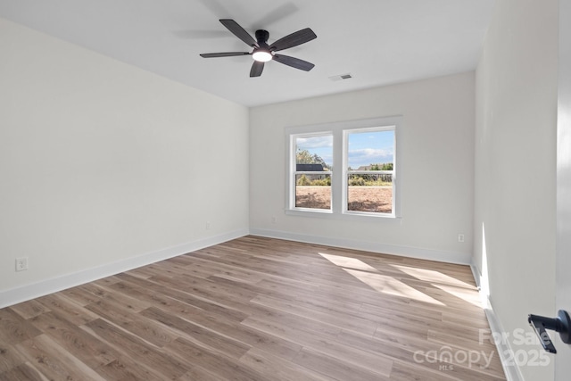 unfurnished room featuring light hardwood / wood-style floors and ceiling fan