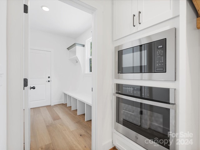 mudroom with light wood-type flooring