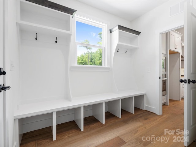 mudroom with light wood-type flooring