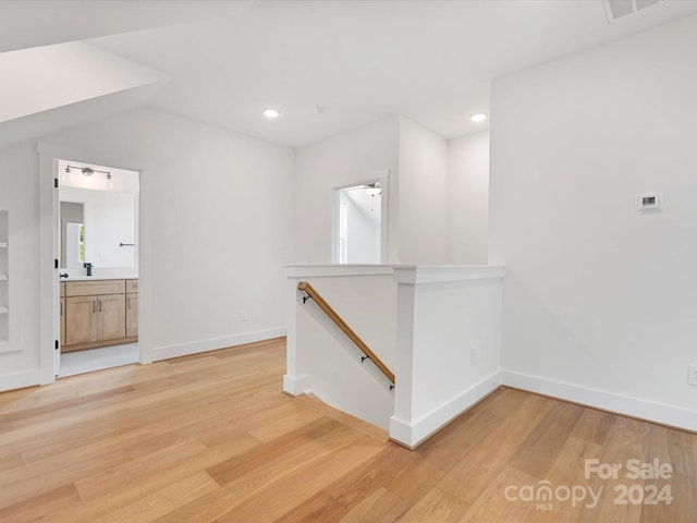 hallway featuring light wood-type flooring