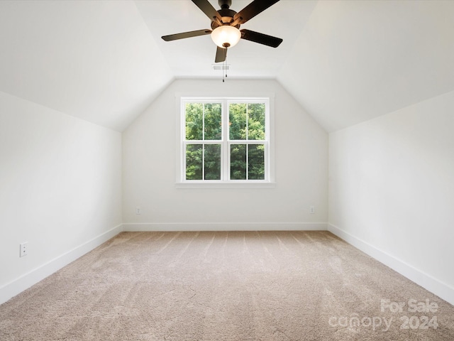 bonus room with carpet, lofted ceiling, and ceiling fan