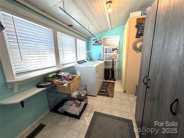 laundry room with independent washer and dryer and wood ceiling