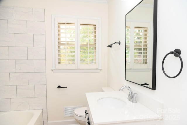 full bathroom featuring toilet, vanity, bathing tub / shower combination, and a healthy amount of sunlight