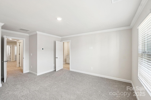 unfurnished bedroom featuring light carpet, multiple windows, and ornamental molding