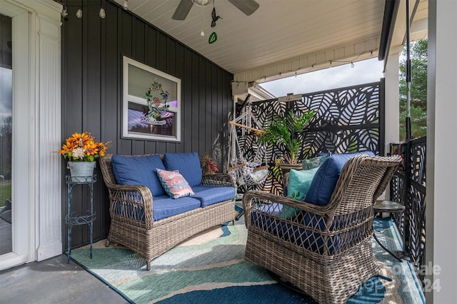 view of patio with ceiling fan and an outdoor living space