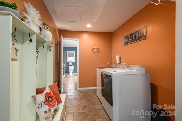 laundry area with washing machine and dryer