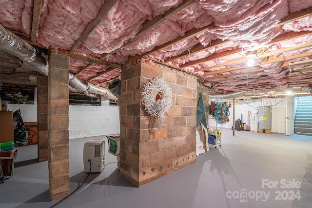 basement featuring electric water heater