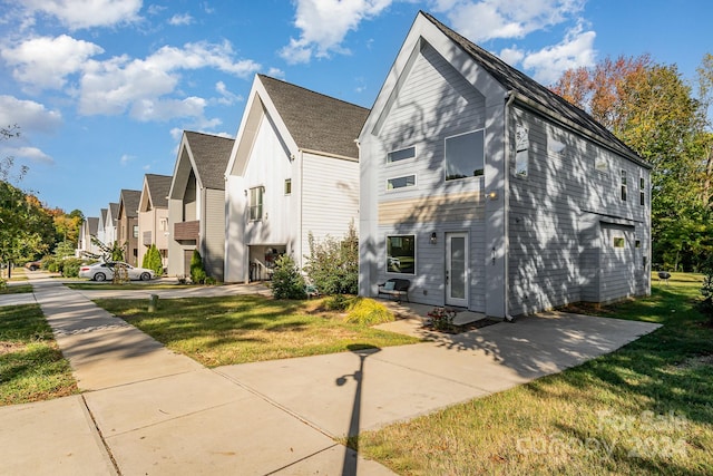 view of home's exterior featuring a lawn