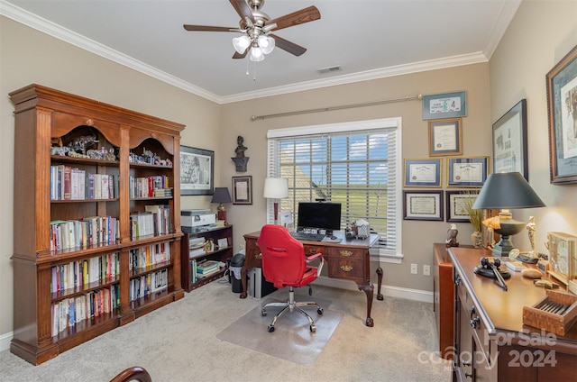 office featuring light carpet, ceiling fan, and ornamental molding