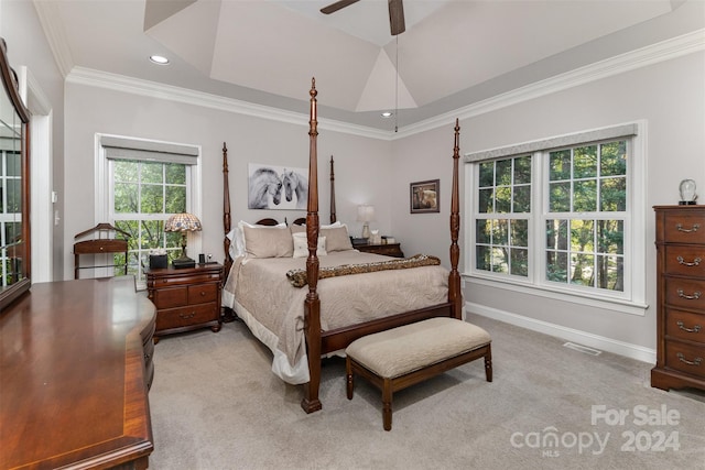 bedroom with ceiling fan, light colored carpet, and ornamental molding