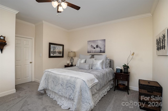 bedroom featuring carpet flooring, ceiling fan, and ornamental molding