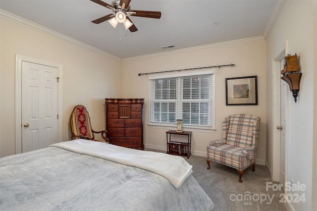 bedroom featuring carpet, ceiling fan, and crown molding