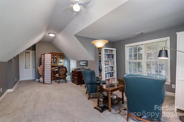 carpeted office featuring ceiling fan and lofted ceiling