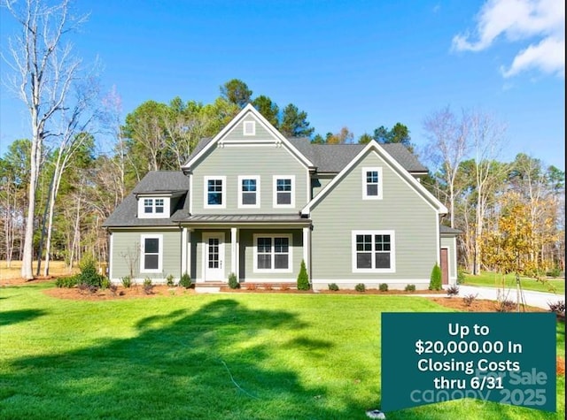 1865 Rock Hill Church Rd Unit 3, Matthews, NC 28104 - back of property featuring a yard, covered porch, and a standing seam roof