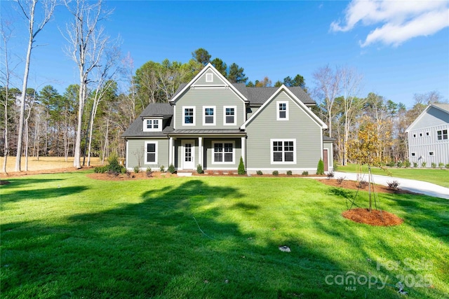 1865 Rock Hill Church Rd Unit 3, Matthews, NC 28104 - view of front of house featuring covered porch, a front lawn, a standing seam roof, and a metal roof