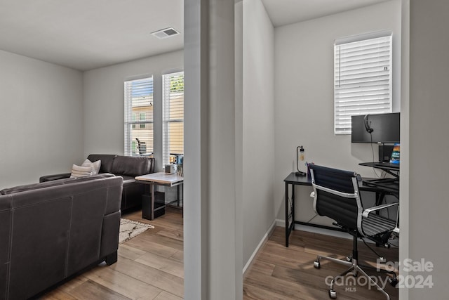 office with hardwood / wood-style floors