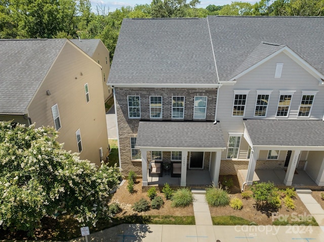 view of front of property featuring a patio