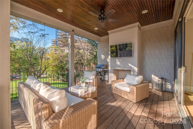 deck featuring outdoor lounge area and ceiling fan