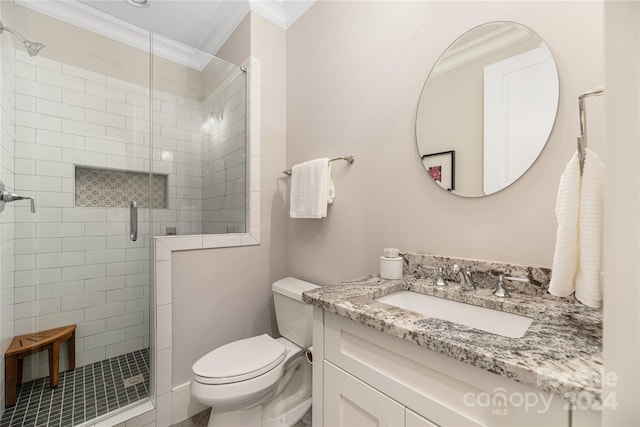 bathroom featuring vanity, toilet, crown molding, and walk in shower