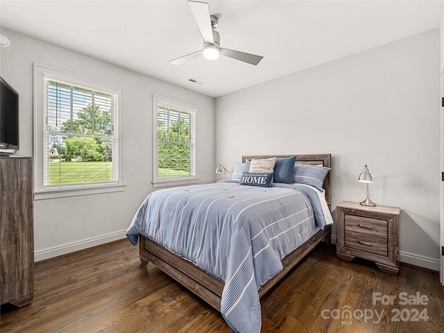 bedroom featuring dark wood-type flooring and ceiling fan