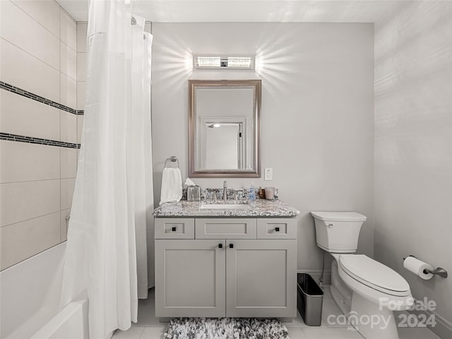 full bathroom with toilet, shower / bath combo, vanity, and tile patterned flooring