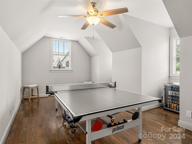 recreation room with dark wood-type flooring, ceiling fan, and lofted ceiling