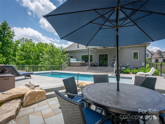 view of pool featuring a patio