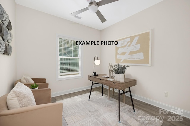 office area with ceiling fan and light hardwood / wood-style flooring