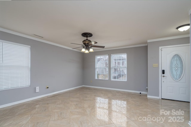 foyer entrance featuring light tile patterned floors, ceiling fan, and ornamental molding