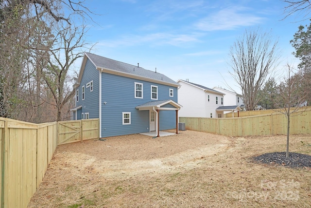 back of house with a patio area