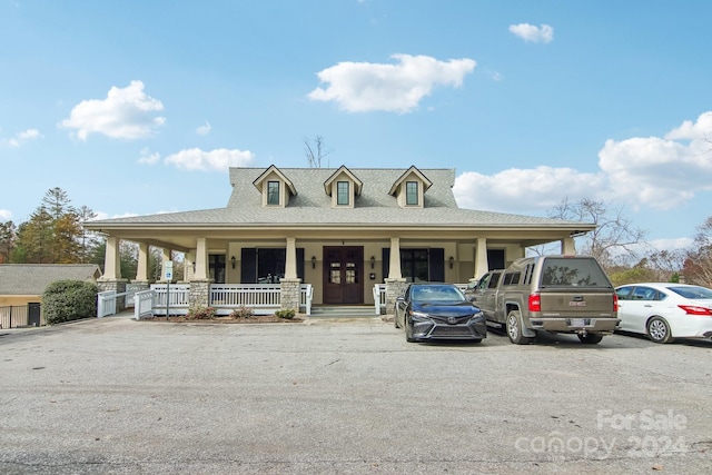 farmhouse-style home with a porch