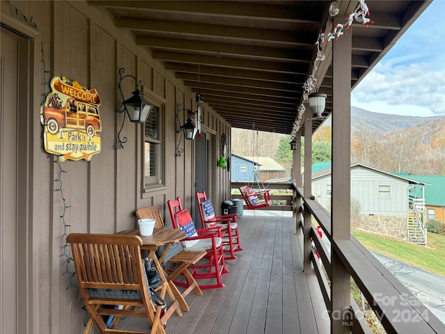 12 Boulder Ln, Maggie Valley, NC 28751 - wooden terrace featuring a mountain view and covered porch