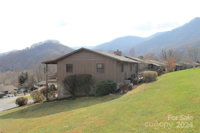 12 Boulder Ln, Maggie Valley, NC 28751 - view of side of property featuring a mountain view and a yard