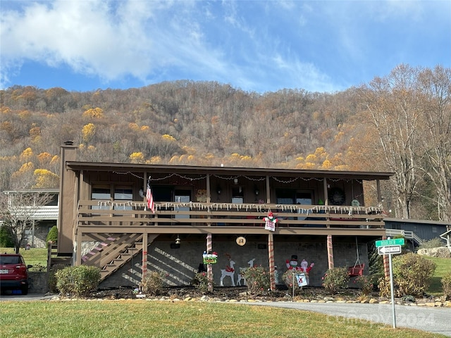 12 Boulder Ln, Maggie Valley, NC 28751 - back of property with a forest view and stairway