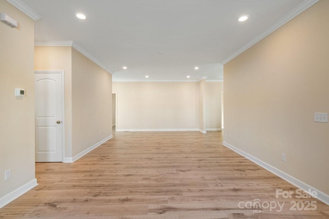 corridor featuring light hardwood / wood-style floors and crown molding