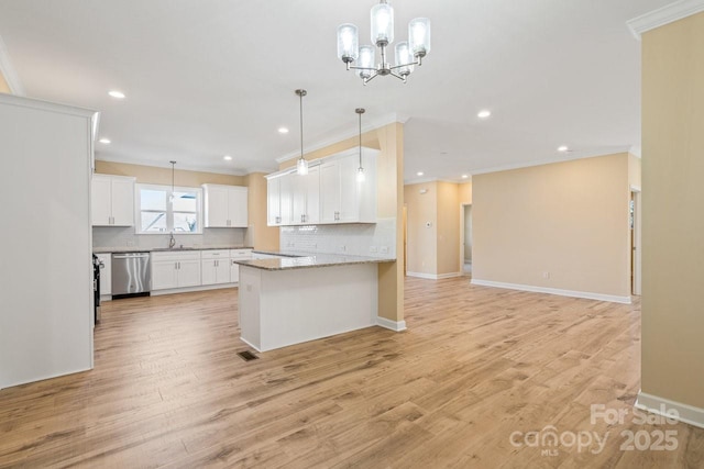 kitchen featuring white cabinetry, dishwasher, light stone countertops, sink, and kitchen peninsula