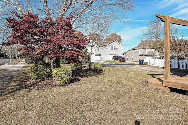 view of yard featuring a garage