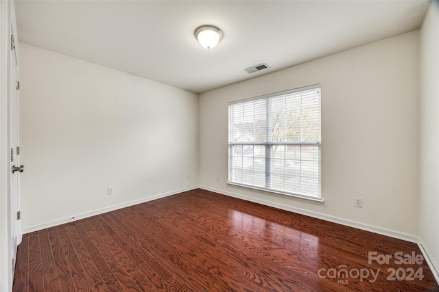 empty room featuring hardwood / wood-style floors