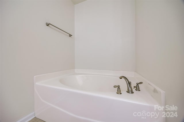 bathroom featuring a tub