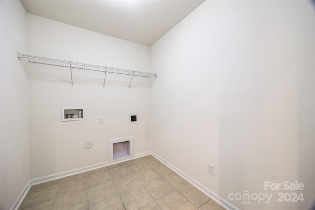 clothes washing area featuring hookup for a washing machine, hookup for a gas dryer, and electric dryer hookup