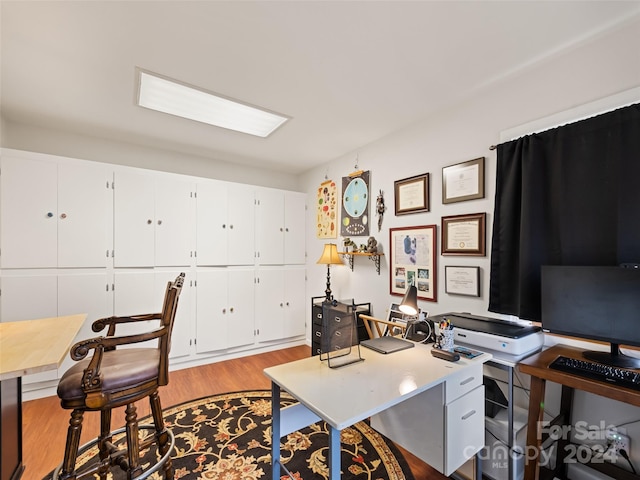 home office featuring light hardwood / wood-style floors