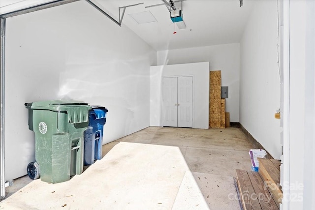 garage featuring a garage door opener