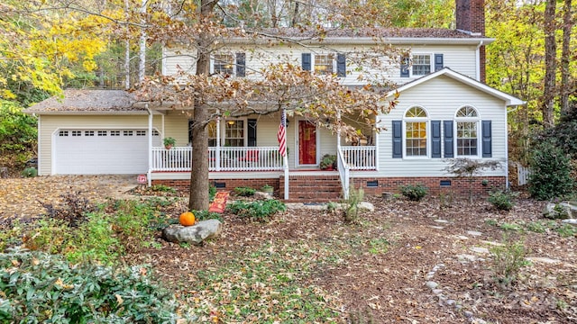 view of front of home featuring a garage and covered porch