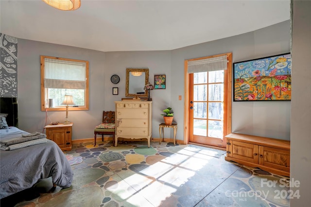 bedroom featuring multiple windows