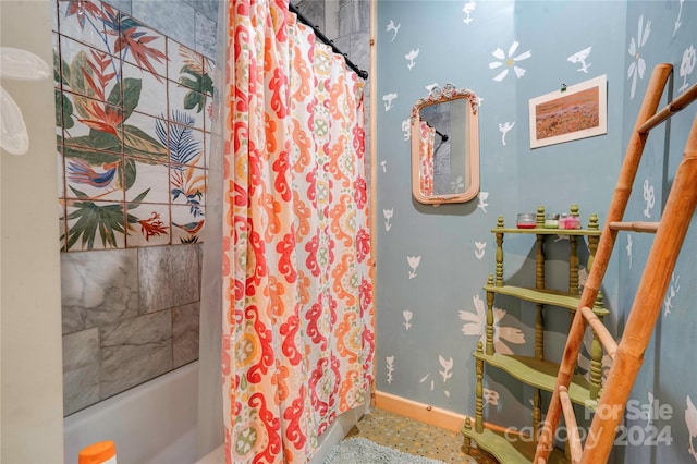 bathroom with shower / bathtub combination with curtain