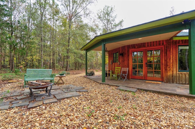 view of yard with a patio area and french doors