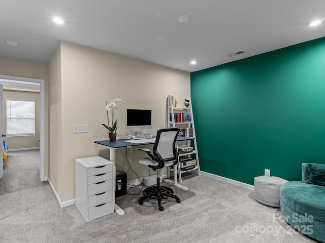 office area featuring light colored carpet