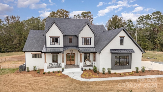 modern inspired farmhouse featuring french doors