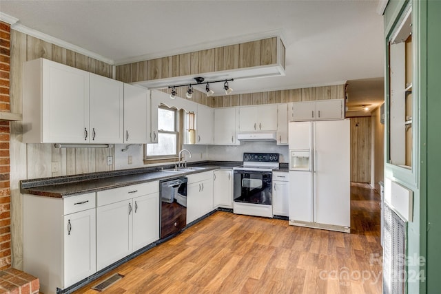 kitchen featuring white appliances, white cabinets, sink, light hardwood / wood-style flooring, and ornamental molding